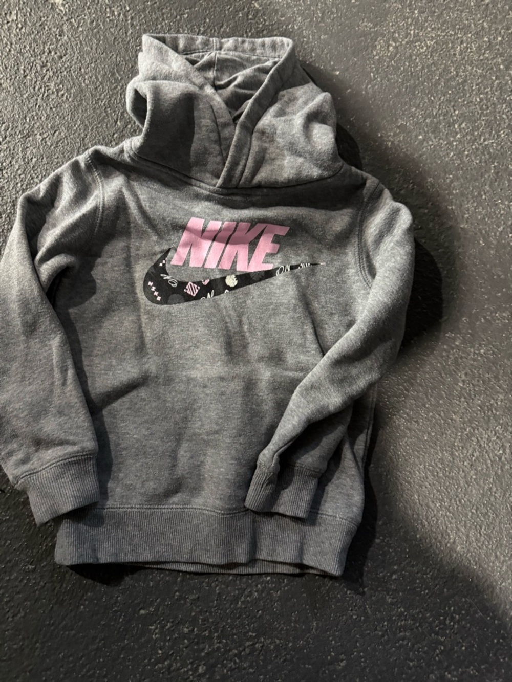 Nike Gray Pullover Hoodie with Pink Logo and Patterned Swoosh